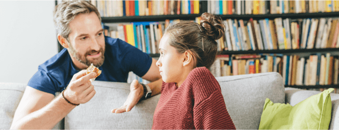 man speaking with teen