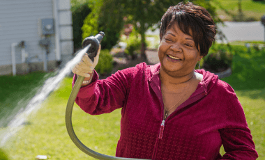 woman watering garden