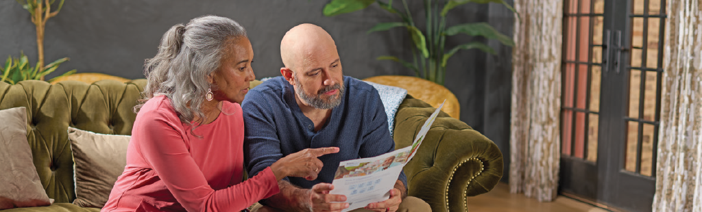 Woman and man reading pamphlet
