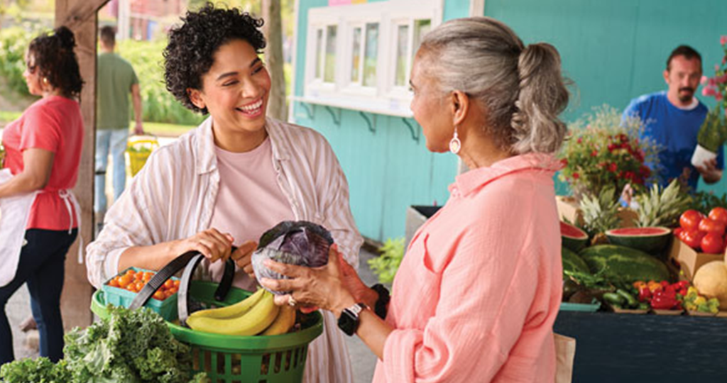 Two women in grocery store
