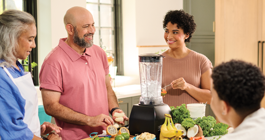 Family smiling at table