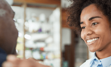 doctor speaking with elderly patient